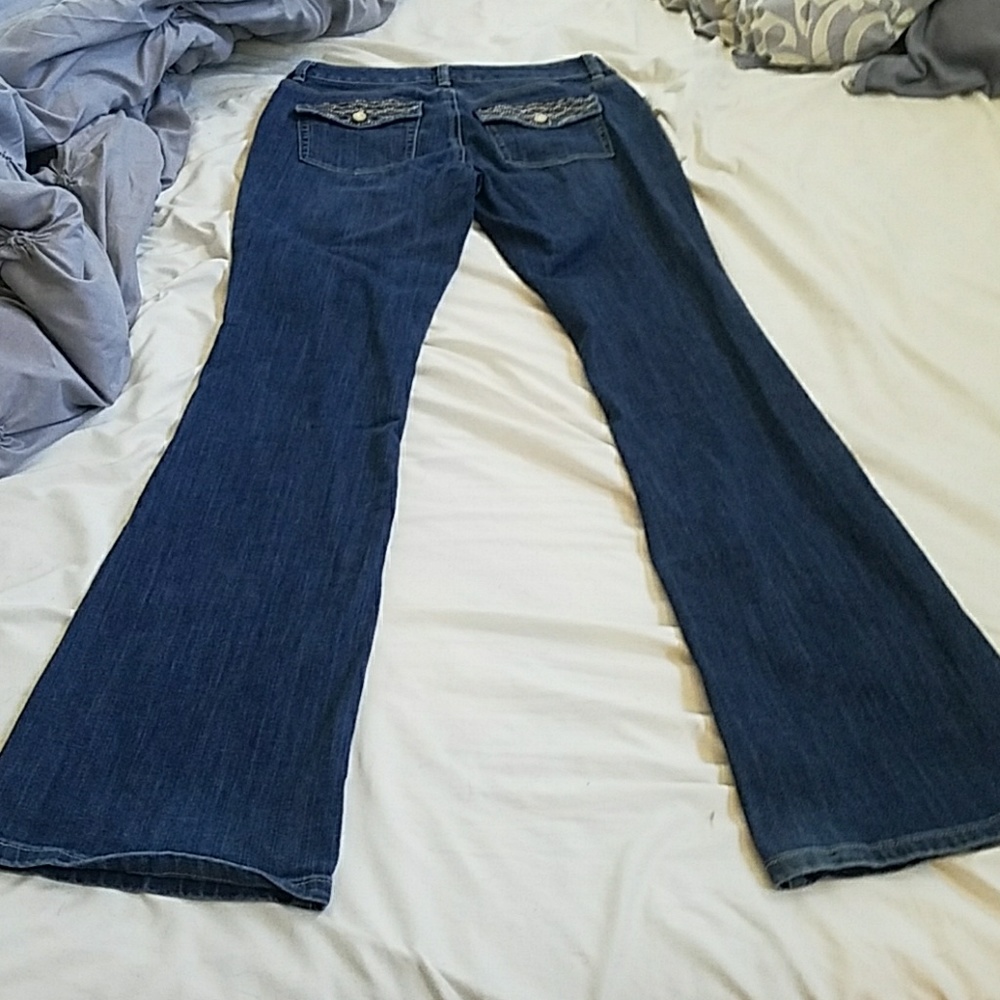 Jeans. 4 long. Book cut with slight flare.